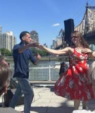 A couple dancing along to the all women salsa band “Lulada Club,” which helped draw over 700 people to the East River Waterfront and Andrew Haswell Park at E. 60th St. on June 1, 2024. Photo: Alessia Girardin.
