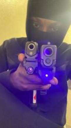 Quadiar Diggins, 17, took several photos of himself flaunting illegally acquired firearms, prosecutors said. Photo: