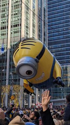 <b>Stuart the Minion floats down Sixth Ave.</b> Photo: Brian Berger