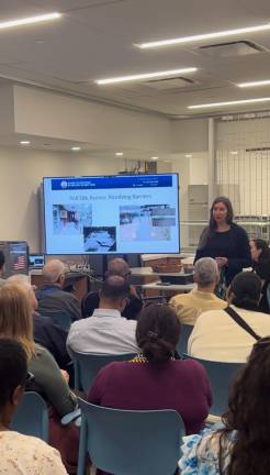 Ariel Merkel, the ADA Coordinator for the NYC Board of Elections, leading the August 21 accessible voting presentation at W. 64th St’s Lighthouse Guild.