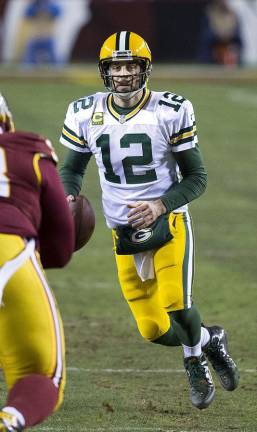 Aaron Rogers, who is trading his Green Bay Number “12” to take number “8” in new season with Jets, has made his new team the most talked about in the offseason. In a little over a week, the Jets will have to start delivering on the preseason hype. Photo: Keith Allison, Wikimedia Commons