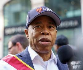 Mayor Eric Adams wore a cap with both the Mets/Yankees logo during the Columbus Day parade. At his weekly press conference on Oct. 22, he admitted he’s a Mets fan, but his partner is a Yankees fan. And much like our columnist, he wishes the Yankees well in the World Series.