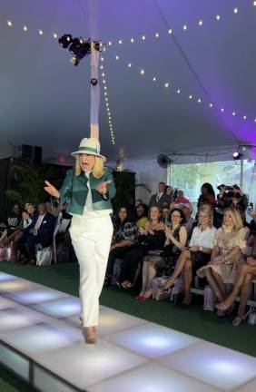 Former US Congress Member Carolyn Maloney greets the A-lister audience as they cheer her on. She was wearing Karolina Zmarlak’s label KZ_K Studio - a woman-owned business.