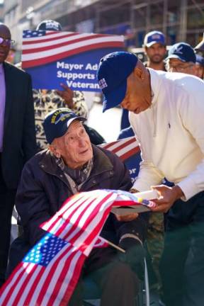 Eric Adams with a vet who served on the fast battleship USS Alabama which saw action in the Pacific theater of WWII