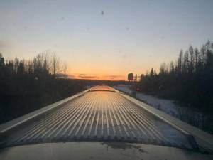 On a beautiful March day, the sun has set on a rugged Albertan wilderness. Our viewing platform is a seat in a glass-domed railroad car as it makes irs way across Canada.