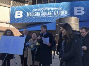 Brad Hoylman-Sigal (at mic) speaking at a rally outside Madison Square Garden in January 2023.