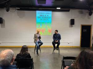 Filmmaker Jamie Fitzpatrick (right) and author Andrew Serra at the book launch party for the novel <i>Hell’s One Hundred Acres,</i> held at the community space DCTV, which is in the historic building that once housed FDNY Engine 31 on Lafayette Street.