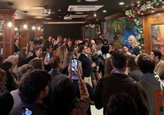 Virginia Maloney is the fifth Democratic candidate to enter the race for city council in District 4, vying to fill a city council seat once held by her mother, former Congress member Carolyn Maloney. Virginia Maloney (standing above crowd) held her fundraiser at St. Pat’s Bar &amp; Grill on W. 46th St.