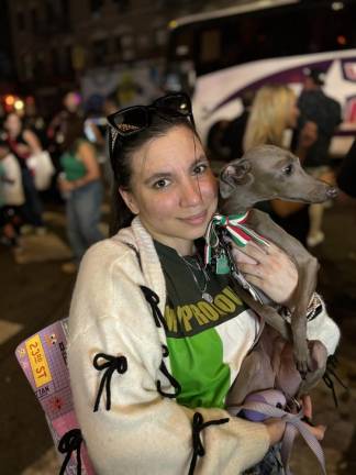 Giselle Girraputo holds her beloved Italian greyhound Giovanni as she made her second visit to this year’s festival on Sept. 14. She says she comes every year “for the people and the food.”