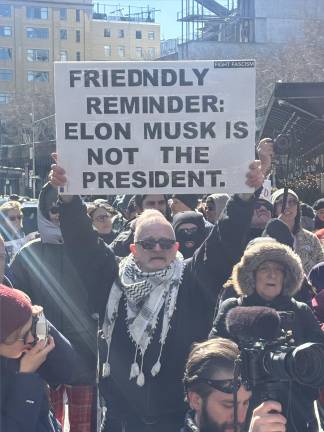 About 350 demonstrators turned out for an anti-Elon Musk rally outside a Tesla showroom in the Meatpacking District on March 8.