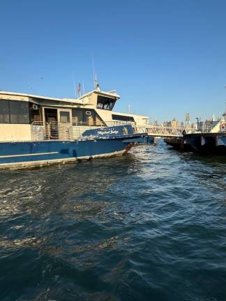 The disabled Ferry Father Mychal Judge after passengers and crew were evacuated and it was towed to port in Weehawken, NJ.