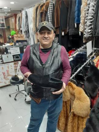 While the sign on the door says “Raffelo’s Furs,” the proprietor, Rafael Allayev, has a special affinity for shoes. He learned the cobbler trade from his father, growing up in Tajikstan.