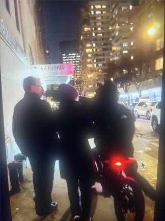 The moment when an enraged e-biker punches a British tourist in the face moments after an encounter on in the intersection of Third Ave. and E. 69th St.