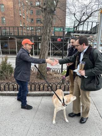 Keith Powers (rear), the term-limited City Council District 4 member, has not endorsed anyone in the Council race, but is instead spending time on the campaign trail with five of six of them. Here he campaigns with Ben Wetzler on the Upper East Side.