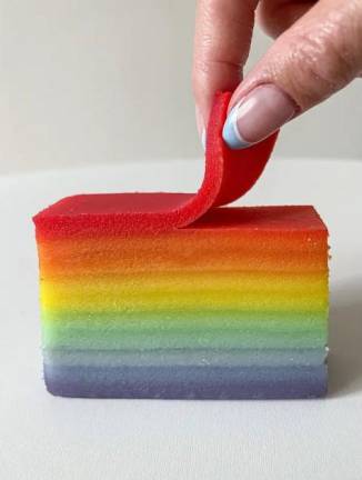 The viral Indonesian Rainbow Cake is made from coconut milk and palm sugar, and the layers are dyed naturally with beets, turmeric and pandan. Photo: Karen Su