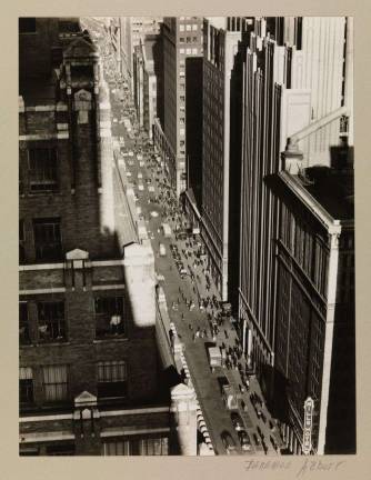 Berenice Abbott. &quot;Seventh Avenue Looking North from 35th Street,&quot; Dec. 5, 1935. Gelatin silver print. Museum of the City of New York, Museum Purchase with funds from the Mrs. Elon Hooker Acquisition Fund.