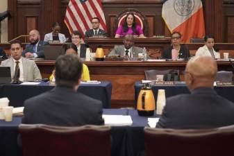 City Planning Commissioner Dan Garodnick, back turned on left, presenting to the NY City Council. Two Council committees have now passed a modified version of the City of Yes housing plan pushed by the CPC.