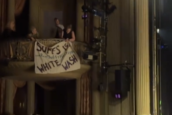 A group protested during a performance of “Suffs” with a banner reading “Suffs is a white wash.”