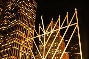 The world’s largest menorah, standing at 36 ft. and weighing 4,000 lbs. will be lit at sundown every night of Hanukkah this year starting on Dec. 25 on Fifth Ave. and 59th St.