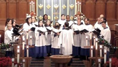 The choir at Brick Prebyterian Church at its Lessons &amp; Carols tradition on Dec. 22.