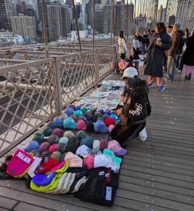 Dozens of Illegal Vendors— &amp; One Giant Ape—Reclaim Brooklyn Bridge from City