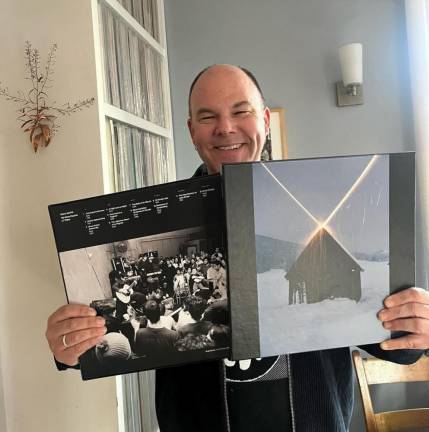 A proud co-parent, Grubbs shows off the three lp vinyl box version of Gastr del Sol <i>We Have Dozens of Titles.</i>