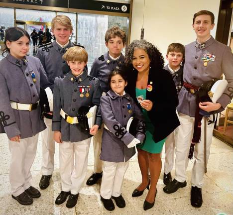 A group of Knickerbocker Greys smile while on their trip to Albany, meeting politicians and legislators supporting their bill.