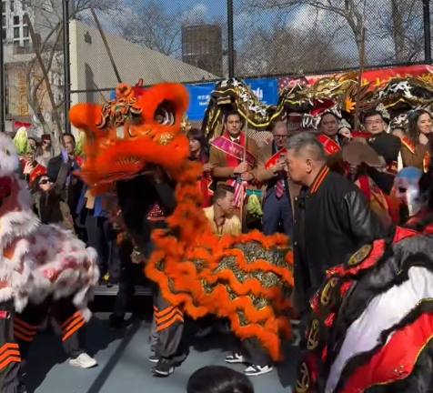 A little dragon dance and percussion on the basketball courts. City Council member Christopher Marte and Borough President Mark Levine at center rear.