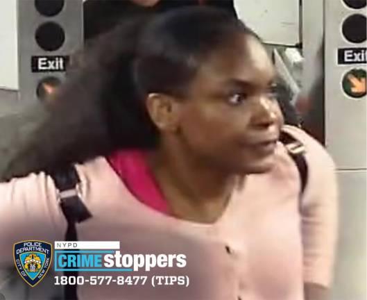 Suspect Charmaine Crossman was still wearing the pink sweater seen in the surveillance video. Photo courtesy NYPD and MTA