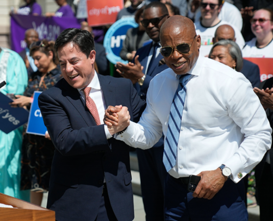 DCP Commissioner Dan Garodnick (left) and NYC Mayor Eric Adams (right) during an April 29 rally promoting ‘City of Yes’ zoning changes. They went on <i>PIX11 </i>on May 20 to further campaign for the text amendment.