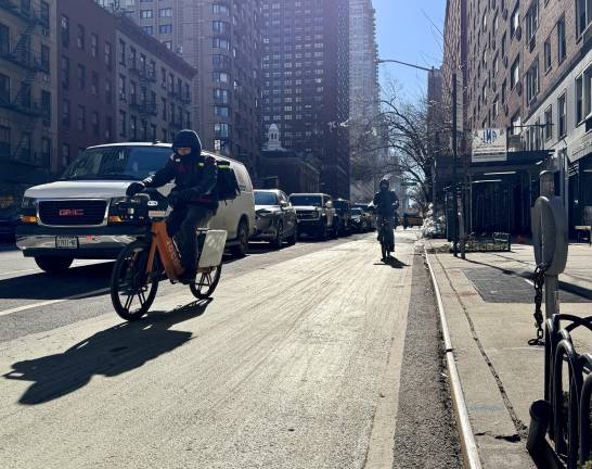 Delivery drivers cruise up Third Avenue, moving quickly through the intersections as the “green wave” gives them green lights, some for up to 36 city blocks from East 60th Street to East 96th Street.