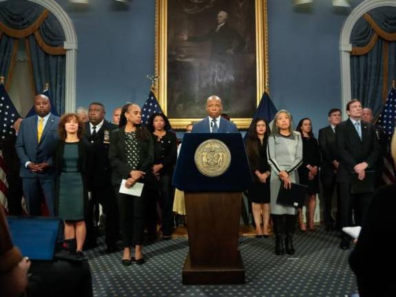 Mayor Eric Adams brought a full contingent of aids to his first post Presidential election press briefing that included acting police commissioner Tom Donlon (to the far right in photo).