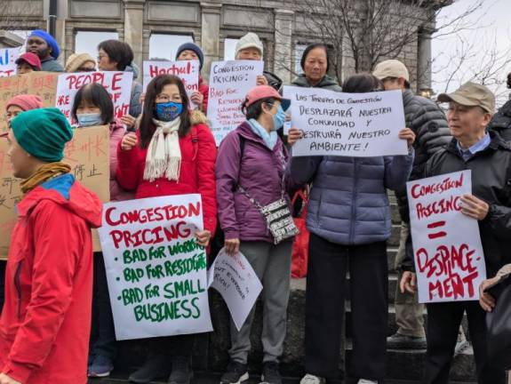 Chinatown protests against congestion pricing at a rally at the base of the Manhattan Bridge on Dec. 17, 2024. City council member Chris Marte was among the protestors opposing congestion pricing.