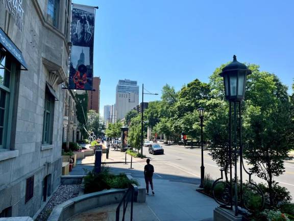 Tree-lined Rue Sherbrooke in Montreal is perfect for walking and visiting museums nearby,