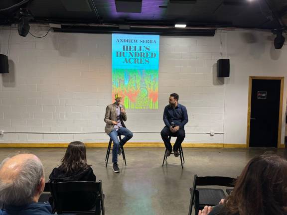 Filmmaker Jamie Fitzpatrick (left) and author Andrew Serra (right) at the book launch party for the novel <i>Hell’s Hundred Acres,</i> held at the community space DCTV, which is in the historic building that once housed FDNY Engine 31 on Lafayette Street.