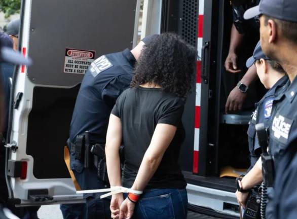 <b>Nearly a dozen tenant advocates were arrested while protesting at a Rent Guidelines Board meeting at Hunter College, June 17, 2024.</b> Photo: Ella Napack/THE CITY