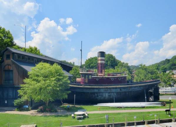 Former St.Lawrence River tugboat had been donated to the Hudson River Maritime Museum. It sits outside, showing its full height, as an important part of the museums’ collection, dating from 1898.