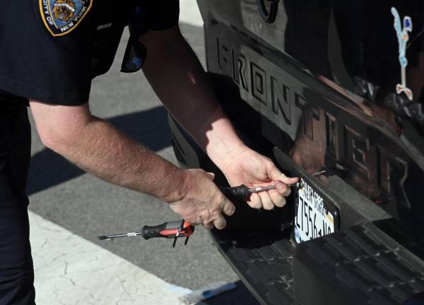 Interagency vehicle enforcement operation at the Queens-Midtown Tunnel on Monday, May 20, 2024. NYPD. (Marc A. Hermann / MTA)