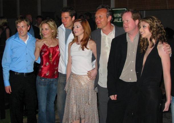 <i><a rel=nofollow href=https://commons.wikimedia.org/wiki/Michelle_Trachtenberg>Michelle Trachtenberg</a> </i>(far right) <i>at the cast wrap for <a rel=nofollow href=https://en.wikipedia.org/wiki/Buffy_the_Vampire_Slayer>Buffy the Vampire Slayer</a></i> where she co-starred with (left to right) <a rel=nofollow href=https://commons.wikimedia.org/wiki/Tom_Lenk>Tom Lenk</a>, <a rel=nofollow href=https://commons.wikimedia.org/wiki/Emma_Caulfield>Emma Caulfield</a>, <a rel=nofollow href=https://commons.wikimedia.org/wiki/Alexis_Denisof>Alexis Denisof</a>, <a rel=nofollow href=https://commons.wikimedia.org/w/index.php?title=Alyson_Hannigan&amp;action=edit&amp;redlink=1>Alyson Hannigan</a>, <a rel=nofollow href=https://commons.wikimedia.org/wiki/Anthony_Stewart_Head>Anthony Stewart Head</a>, <a rel=nofollow href=https://commons.wikimedia.org/wiki/Joss_Whedon>Joss Whedon</a>, <a rel=nofollow href=https://commons.wikimedia.org/wiki/Michelle_Trachtenberg>Michelle Trachtenberg</a>. Trachtenberg played pesky Dawn Summers in the popular teen series.