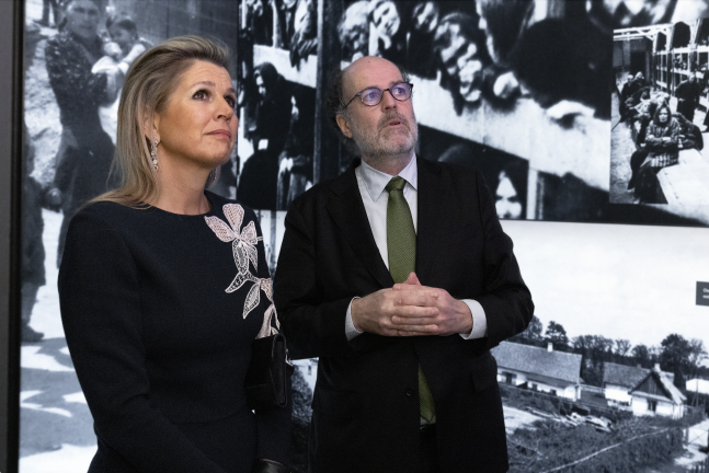 Queen Máxima of the Netherlands is led by Ronald Leopold executive director through the Anne Frank exhibition, a replica of the famous annex on display in her homeland.