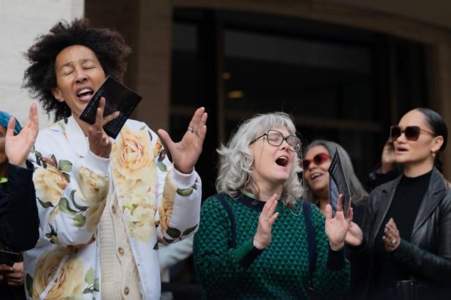 Fans turn out at Lincoln Center at sing along at Lincoln Center days after his passing. <b>Photo: Laurence Sumulong.</b>