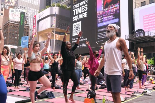 Around 8,000 People Gather to Do the Downward Dog in the Middle of Times  Square