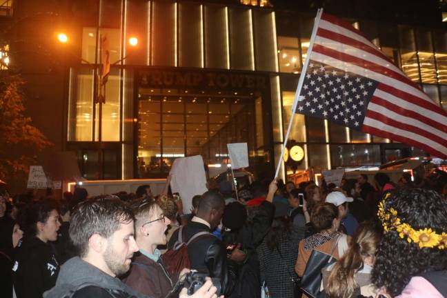 Outside Trump Tower Wednesday night, thousands converged on Fifth Avenue to voice their displeasure at election results. Photo: Micah Danney