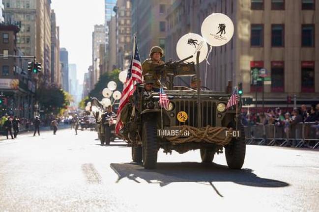 WWII Jeep Rumbles up Fifth Ave. during the annual Veteran’s Day parade on Nov. 11.