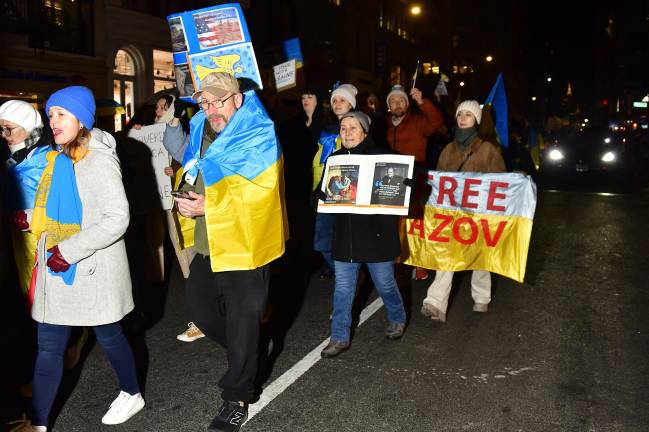 Many of the demonstrators carried photos of friends and relations killed or wounded in the Russo-Ukraine War.