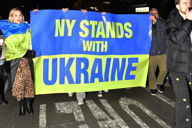 Pro-Ukrainian demonstrators march down Broadway on March 4.