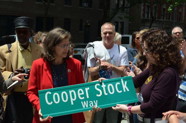 Earlier this month, the street where Cooper Stock died was renamed in his honor. Dana Lerner is on the right, holding the sign with Councilmember Helen Rosenthal