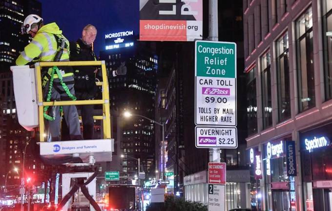 MTA Chairman Janno Lieber as he revealed the congestion pricing sign when the tolls first went into effect at midnight on Jan. 5.