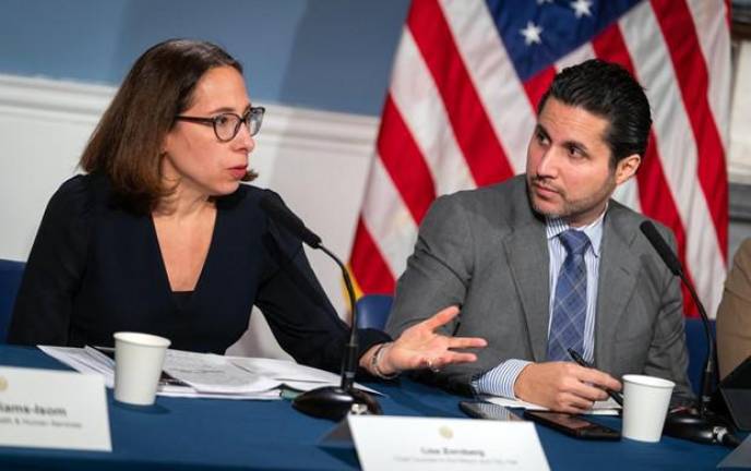 Lisa Zornberg, when she was still chief legal counsel to Mayor Eric Adams, at a weekly press conference while Fabien Levy, deputy mayor for communications, looks on.