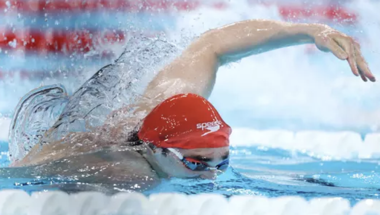 <b>Adell Sabovic, 22, AGUA swimmer turned Olympian represented his family’s home country of Kosovo at the Games on July 30, swimming the 100-meter freestyle and placing second in his heat. </b>